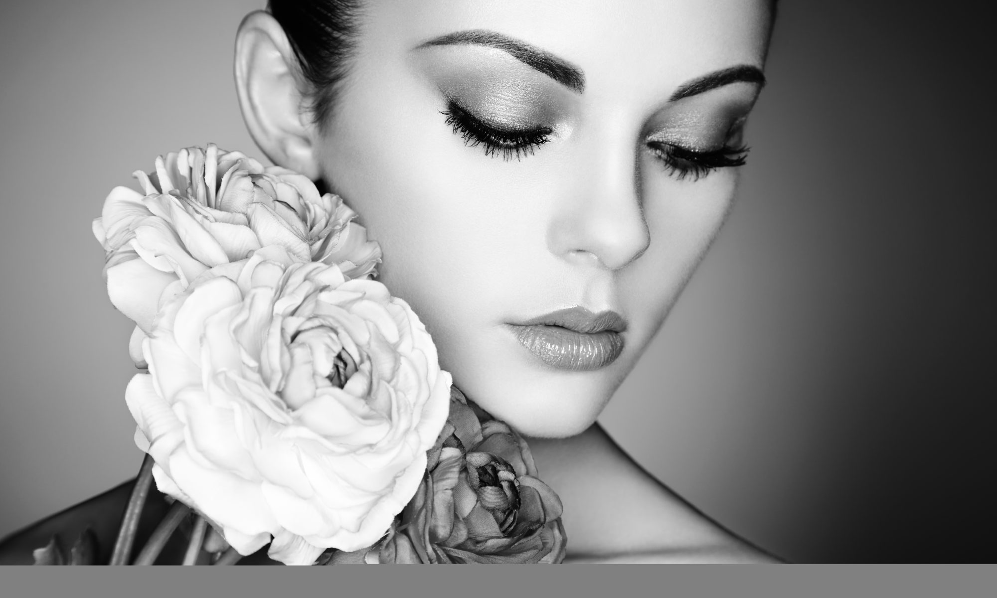 Model holding flowers and looking lovely