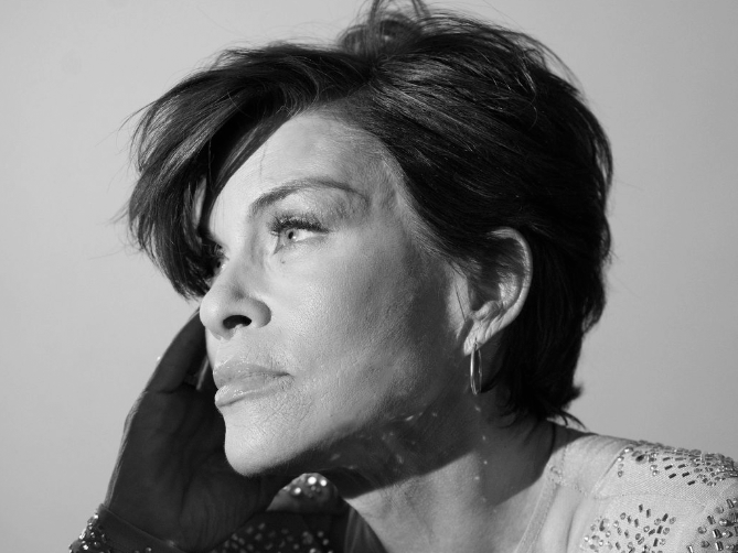 Black and white editorial portrait of a woman after a Deep Plane Facelift by Frank Agullo, MD, FACS (Dr. WorldWide), El Paso, Texas.