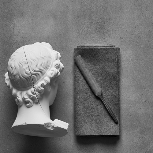 Black and white editorial still life for revision rhinoplasty commentary by Dr. Frank Agullo, MD, FACS.