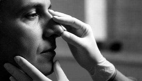 Black and white editorial photograph for septorhinoplasty commentary by Dr. Frank Agullo, MD, FACS.